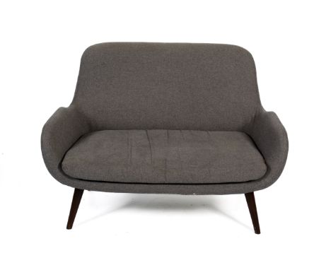 A contemporary retro style 'Moby' two seater sofa. With grey fabric upholstery raised on turned tapering supports. H86cm x W1