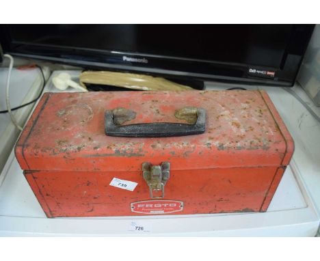 A red tool box and assorted tools