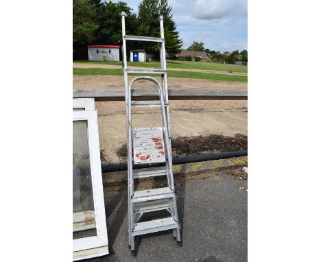 Two folding aluminium step ladders