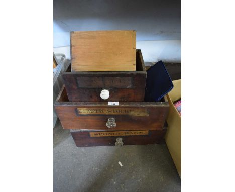 Four assorted vintage apothecary drawers and a small collection of glass ware