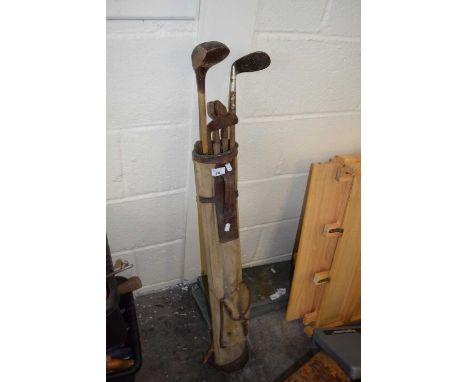 Case of vintage golf clubs