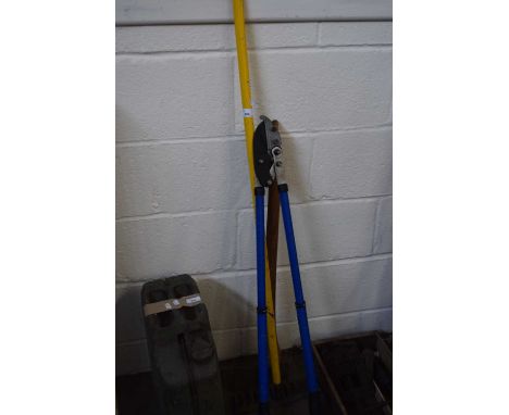 An axe and other garden tools