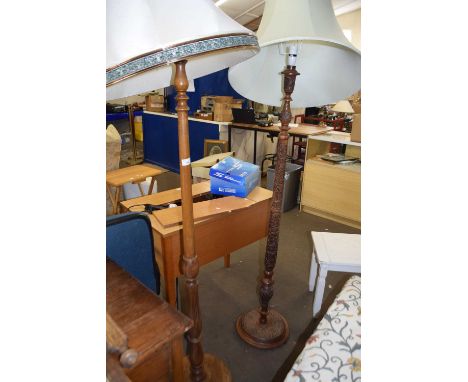 Wooden standard lamp and another with carved decoration (2)