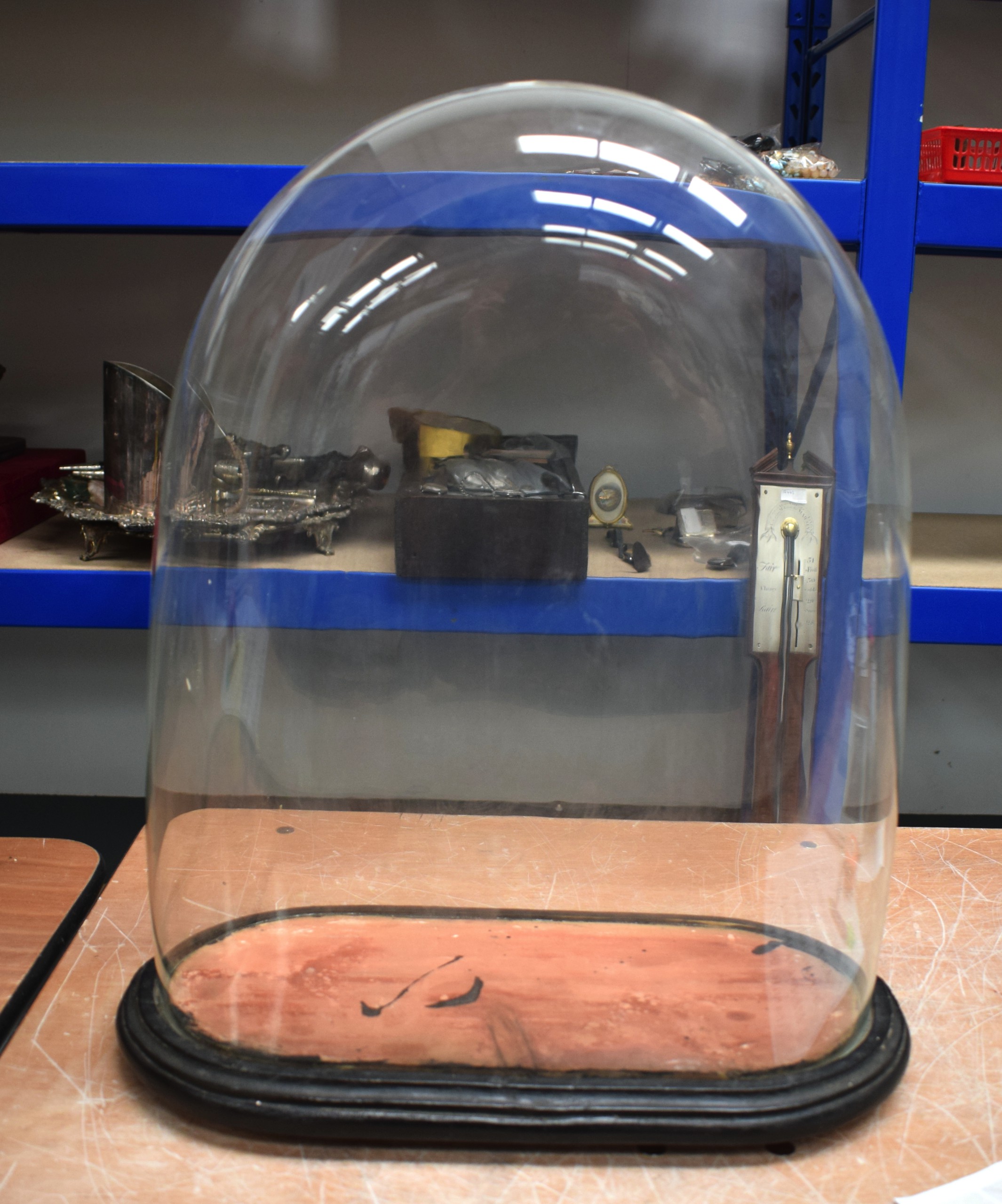 A LARGE ANTIQUE GLASS DOME. 40 cm x 54 cm.