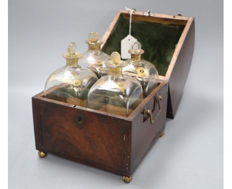 A 19th century Belgian mahogany decanter box containing three gilt decanters