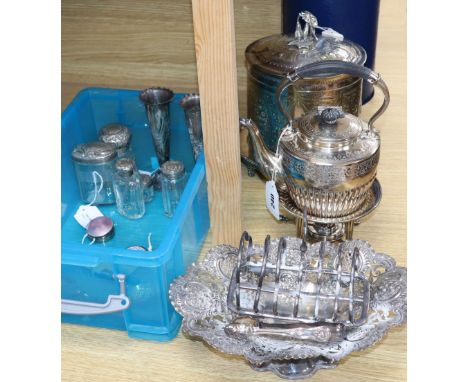 A pair of embossed silver specimen vases, five silver-mounted toilet bottles, two silver and enamel boxes and a quantity of p