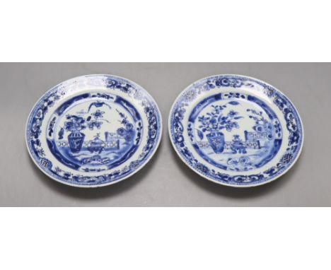 A pair of Chinese Kangxi export blue and white dishes, diameter 16.5cmCONDITION: Several chips to the rim and one hairline cr