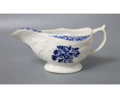 An 18th century Worcester blue and white sauceboat, width 13cm