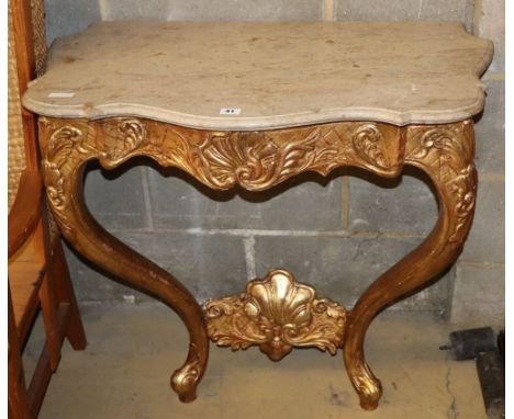 An 18th style French giltwood and gesso marble top serpentine console table, W.84cm, D.50cm, H.78cm