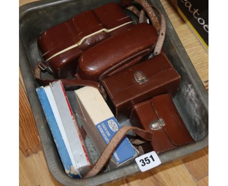A vintage Zeiss Ikon Nettar camera (cased), a Zeiss Movinette (cased) and sundry accessories