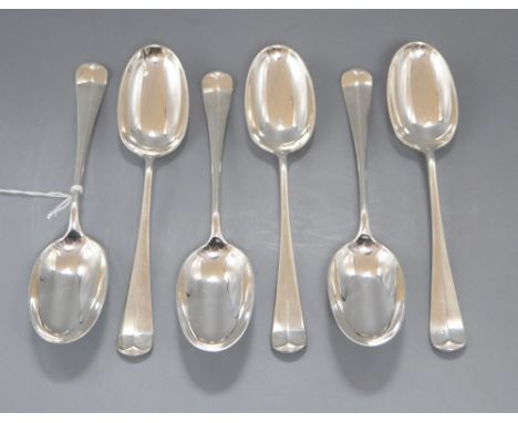 A set of six George V silver hanovarian rat tail pattern dessert spoons, George Howson, Sheffield, 1925, 10.5oz.CONDITION: Mi