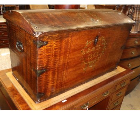 A 19th century Continental painted domed top trunk with simulated grain, W.115cm, D.58cm, H.64cm