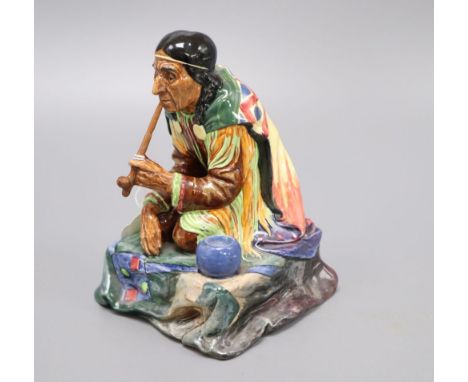 A Royal Doulton figure of Calumet HN1689 (1935-49)CONDITION: Pipe has been restored, the hand holding the pipe has been off a