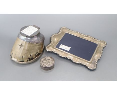 A silver photograph frame, 20.9cm, a Victorian silver patch box and a plated horse's hoof inkwell.