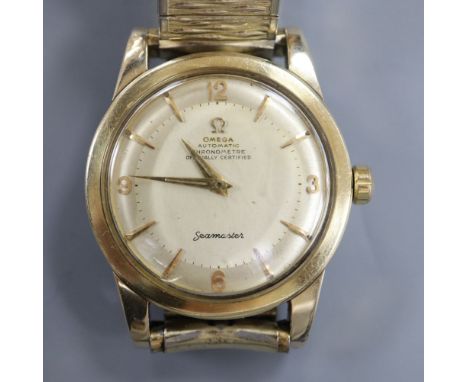 A gentleman's 1950's steel and gold plated Omega Automatic Chronometer Seamaster wrist watch, on associated bracelet, case di