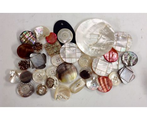 Buttons - a large mother of pearl circular button, 9.5cm diam;  a pair of gentleman's mother of pearl studs, overlaid with ca