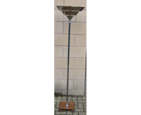 An Art Deco standard lamp, stainless steel flared stepped cylindrical up-lighter, plain square column, square mahogany base s
