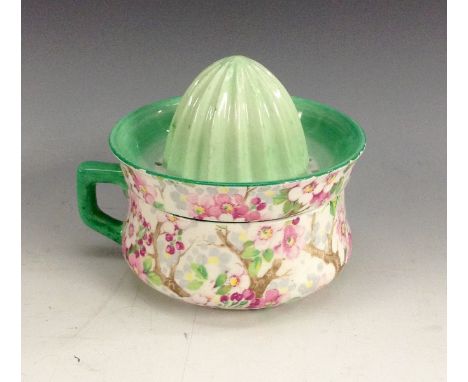 A Shelley Chintz Maytime pattern lemon juicer and squeezer, painted with colourful blossom, painted marks in puce, pattern nu