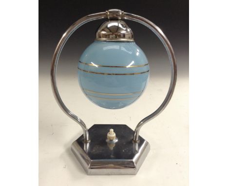 An Art Deco chrome and glass side light, light blue globular shade, chrome mount, hexagonal base, 22cm high, c.1930