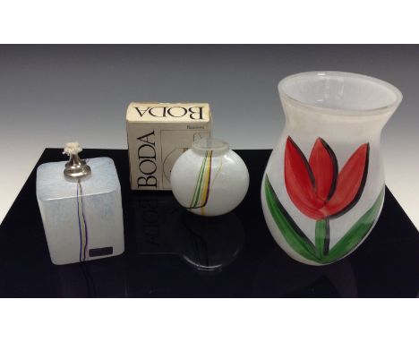 A Kosta Boda ovoid glass vase, brightly painted with red tulips, signed by Ulrica Hydman-Vallien, also signed to base Kosta B