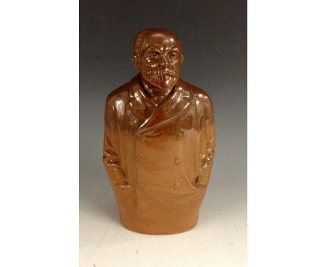 A Doulton Lambeth salt glazed stoneware spirit flask modelled as John Burns, the trade unionist and politician, 19cm, impress