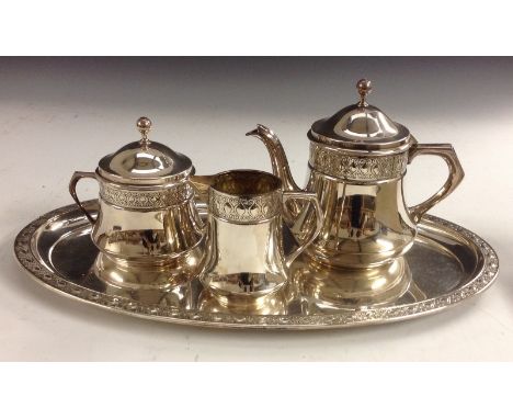 Orivit - a Secessionist style E.P.N.S four piece tea service, comprising teapot, milk jug and sucrier, sphere finials, each w