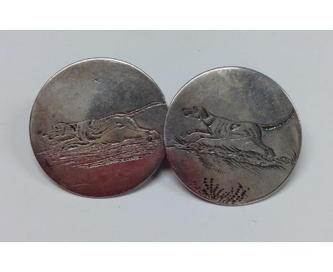 A matched pair of Georgian circular silver buttons, later engraved with scenes of hunting dogs, one Samuel Baker, Birmingham 