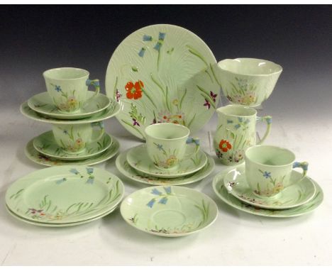 A Beswick pastel green tea service, decorated in relief with flowers and foliage, comprising sandwich plate, sugar bowl, crea