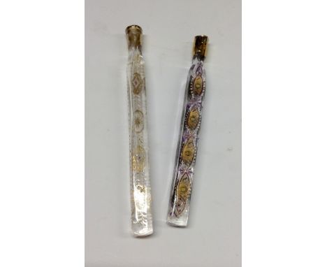 A George III Oxford teardrop lavender clear glass scent bottle, decorated with enamel and applied glass roundels, picked out 