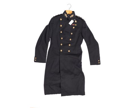A pre WW1 Royal Artillery officer's dark blue full dress greatcoat, with gilt KC buttons, Captain's bullion pips and grenade 