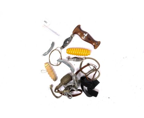 A small quantity of Third Reich dagger parts including pair of SA hilt mounts, orange plastic army grip, SA wooden grip (eagl