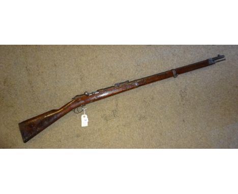 A Prussian 11mm Mod 71/84 bolt action tube magazine rifle, barrel 32" with octagonal breech stamped with crown over Spandau a