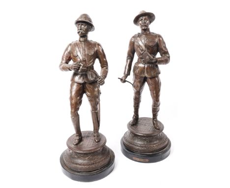 A pair of statues of Boer War Generals Lord Roberts and Baden Powell, spelter mounted on turned wood bases, 16½" high. GC £70