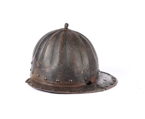 The ribbed skull and peak only of a mid 17th century Zischagge type helmet. Quite GC, worn commensurate with age and superfic