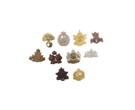 21 post 1920 Canadian cap badges, including Three Rivers Regiment, Algonquin Regiment, Rocky Mountain Rangers, King's Own Cal