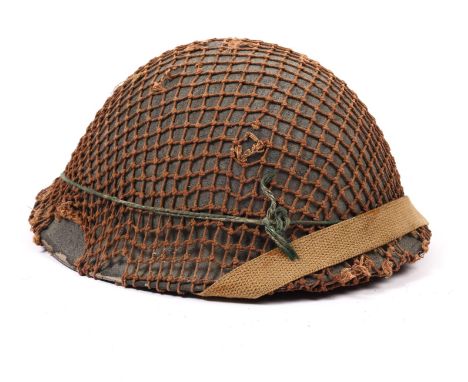 WWII Mk 3 pattern British helmet, correct early liner, has grey formation sign to side, net cover. £80-110