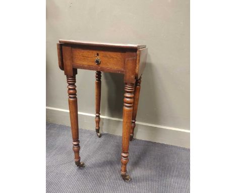 A 19th century mahogany work table on turned legs, 73 x 36 x 43cm, together with brass stick stand