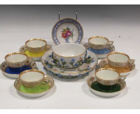 Seven Vienna cups and saucers, the different coloured ground bodies beneath gilt rims; a Meissen bowl and stand encrusted wit