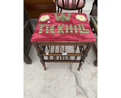 A TAPESTRY UPHOLSTERED MAHOGANY FOOTSTOOL 