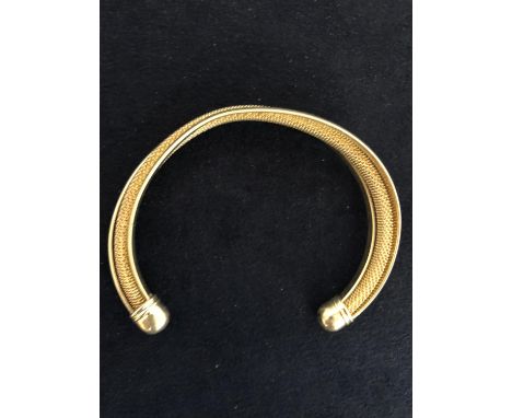 SILVER MARKED FANCY TWIST TORQUE BANGLE. TOTAL GROSS WEIGHT APPROX 29 GRAMS 