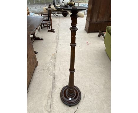 A TURNED MAHOGANY STANDARD LAMP 