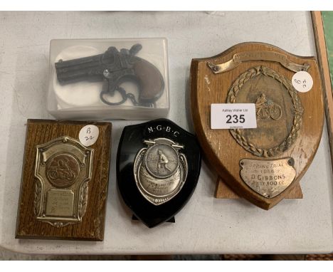 TWO MOTOCYCLE TROPHIES, A FURTHER TROPHY AND A KEY RING 