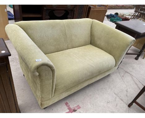 A GREEN TWO SEATER SOFA 