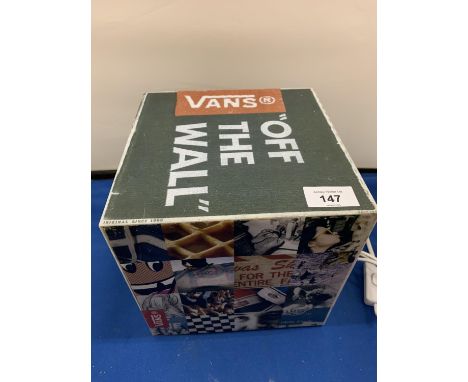 A 'VANS OFF THE WALL' CUBE TABLE LAMP 
