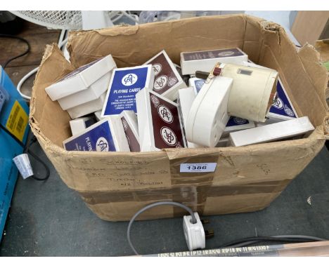 A LARGE QUANITY OF NEW AND SEALED PLAYING CARDS TOGETHER WITH VINTAGE MATCH BOOKS 