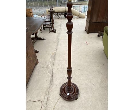 A TURNED MAHOGANY STANDARD LAMP 