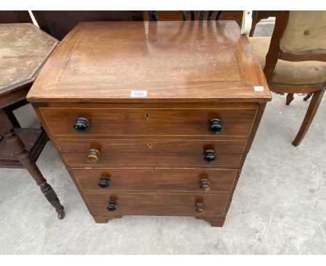 A MAHOGANY COMMODE DISGUISED AS A CHEST OF DRAWERS 