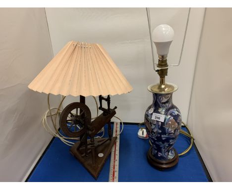 A VINTAGE OAK SPINNING WHEEL LAMP AND A FURTHER  CERAMIC EXAMPLE 