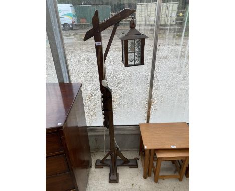 A PINE LANTERN STYLE STANDARD LAMP WITH ADJUSTABLE STAND 