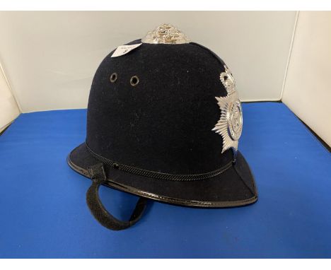 A POLICEMAN'S HELMET 